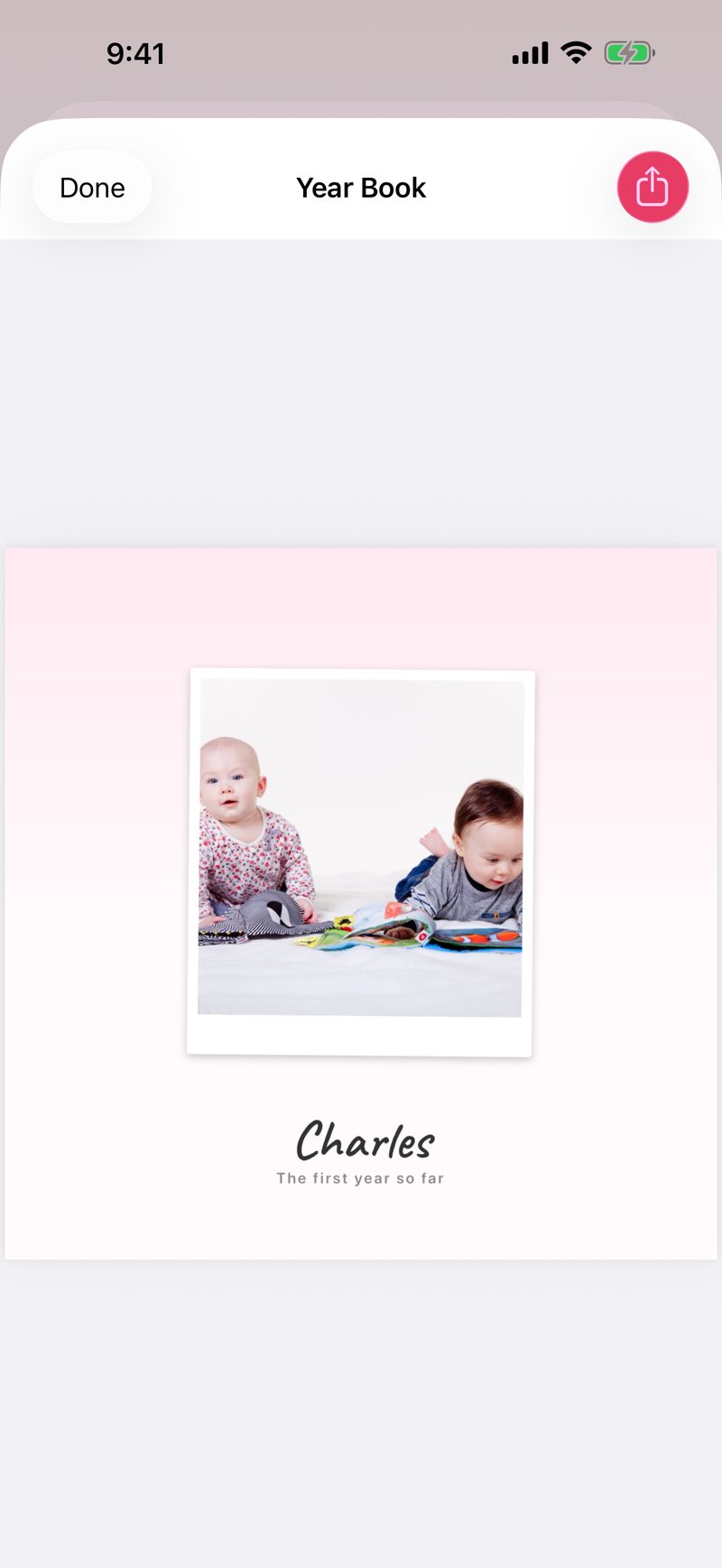 The Year Book cover for a first year still going: an instant photo above the child's name and The first year so far